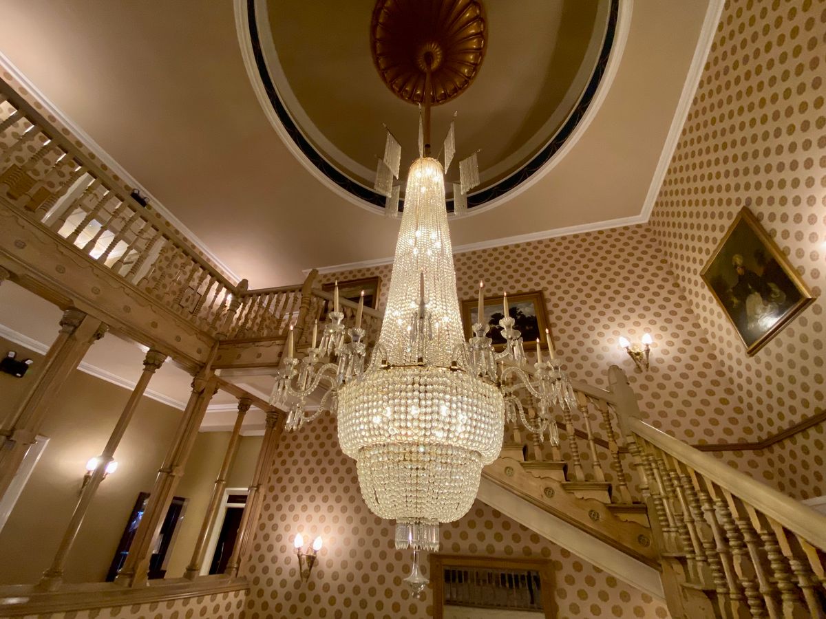 The magnificent 28,000 piece crystal chandelier by the grand staircase in the Chester Grosvenor hotel